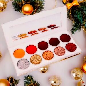 Chdalaybeautycollection is selling Eyeshadow palette and lipglosses